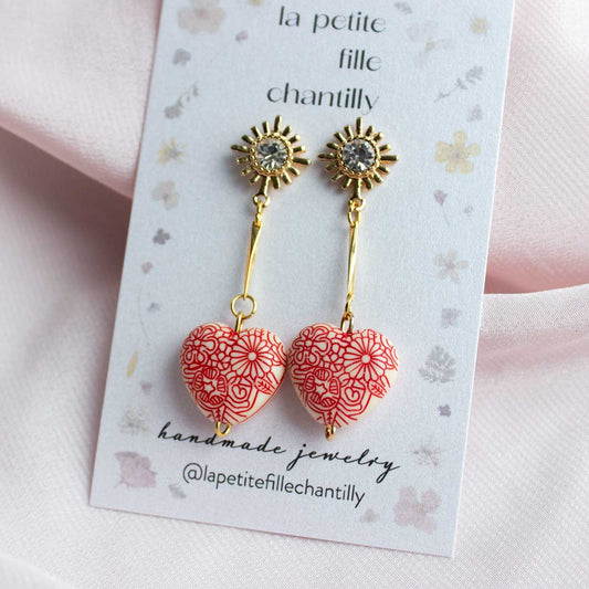 Pendientes de corazón extravagantes